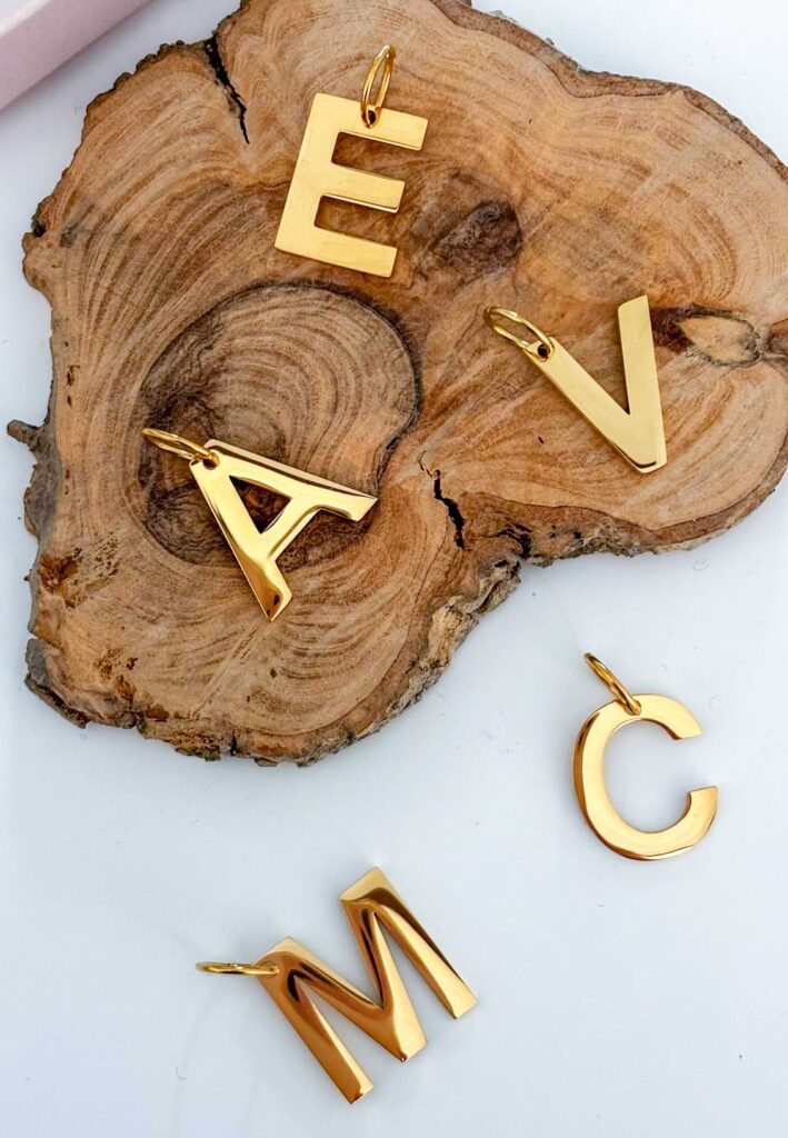 INITIAL Charm